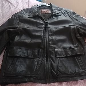 Buttery soft Andrew Marc black leather coat.